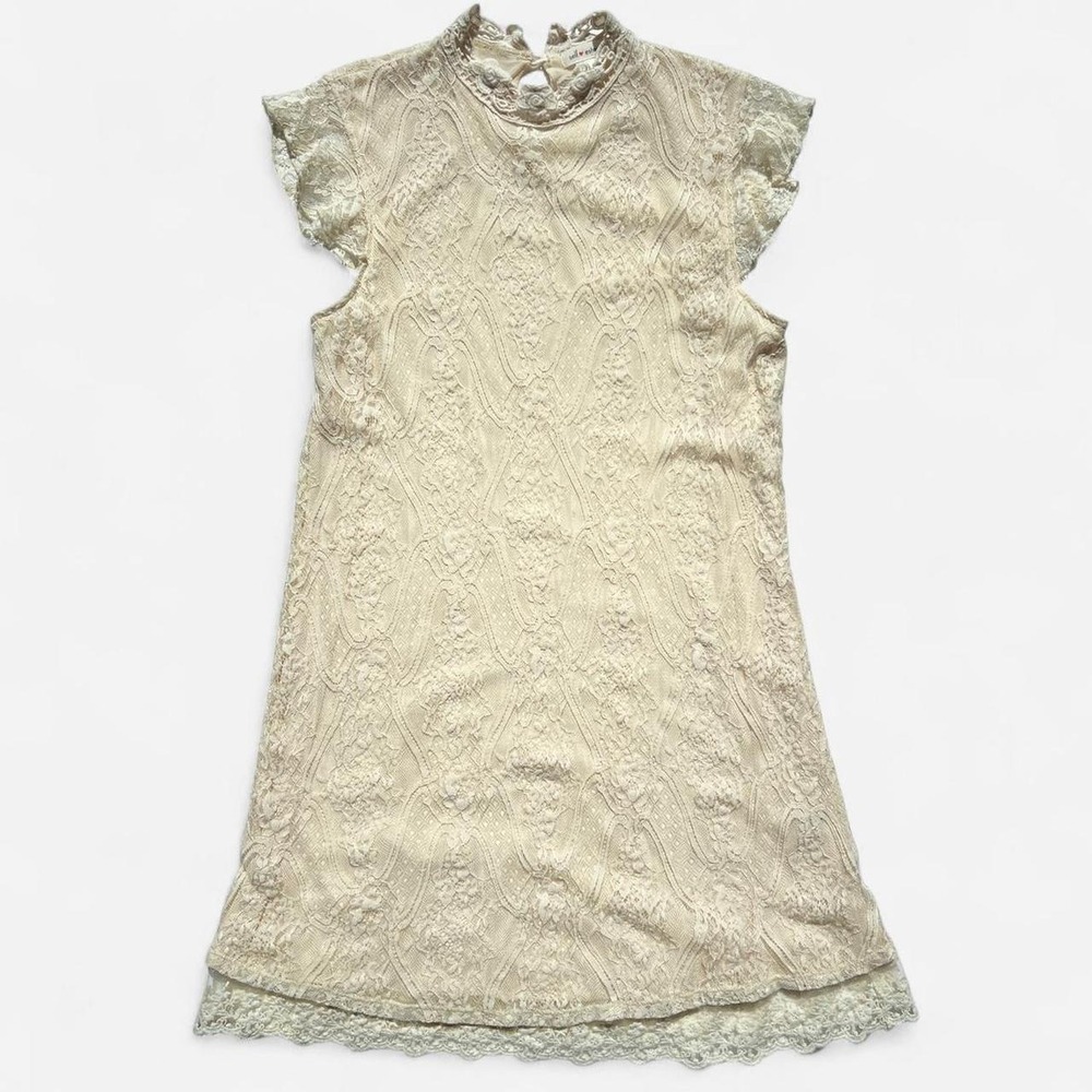 Cream lace mini dress with a romantic